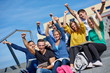 © .shock - students outside sitting on steps