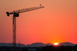 Tower crane in the sunset