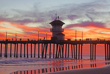 Beach Pier At Sunset In California