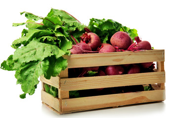 Wall Mural - Young beets with leaves in crate isolated on white