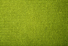 Texture Of A Green Knitted Fabric