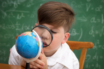 Wall Mural - Schoolboy with loupe
