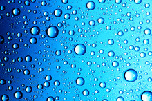Abstract Blue Background Of Waterdrops