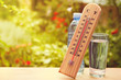 Leinwandbild Motiv Thermometer on summer day showing near 45 degrees