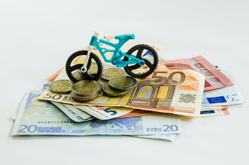 bicycle, coins and banknotes