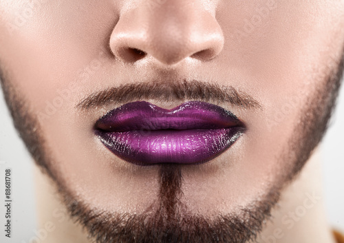 Obraz w ramie Macro photo of bearded male lips with makeup
