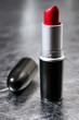 Red lipstick on a silver background