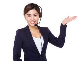 Wall Mural - Call center agent with open hand palm for selling something