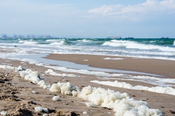 White foam on a sea water surface