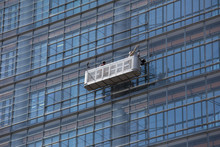 Window Cleaner On Skyscraper Windows