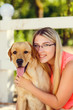 © Olena_Molchanova - portrait of Beautiful young girl with her dog labrador retriever outdoor in summer beautiful park