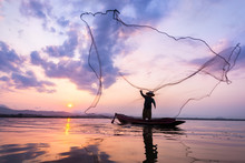 Fisherman Of Bangpra Lake In Action When Fishing Thailand