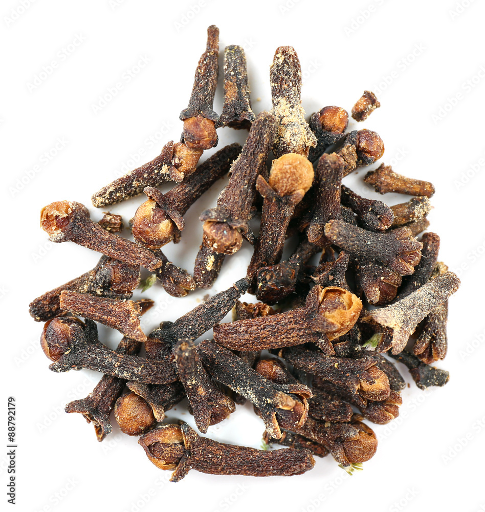 Pile of dried clove spice isolated on white
