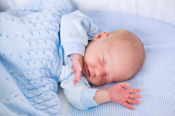 Wall Mural - newborn baby boy in white bassinet