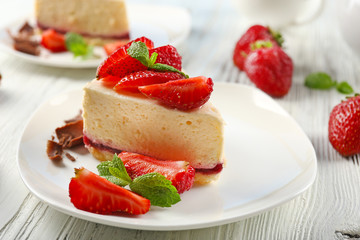 Poster - Delicious cheesecake with berries on table close up