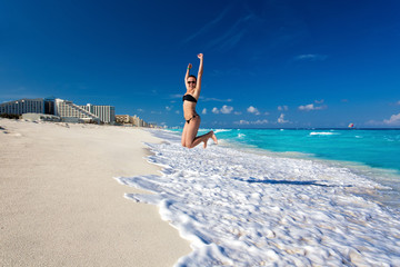 Beautiful woman on the Cancun beach 