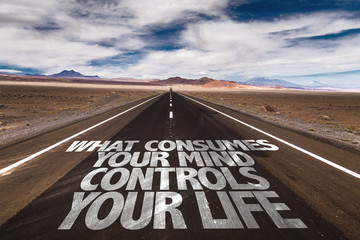 What Consumes Your Mind Controls You Life written on the road