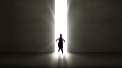 Poster - Businesswoman looking at light shining through opening