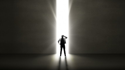 Poster - Businessman looking at light shining through opening