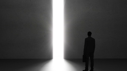 Poster - Businessman looking at light shining through opening