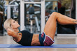 © VICTOR TORRES - Woman Working out in the Gym