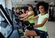 © Nejron Photo - People exercising on a cardio training machines in a gym