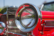© milazvereva - Red detail on the headlight of a vintage car