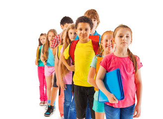 Group of boys and girls standing in the queue