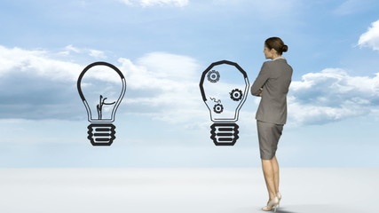 Poster - Businesswoman watching idea concept in the sky