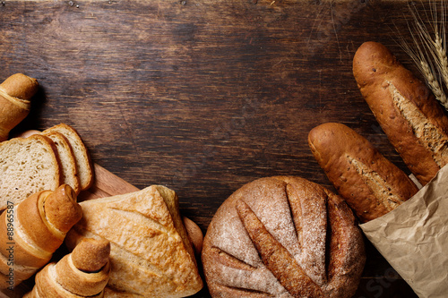 Fotografie, Obraz Different bread on a rustic dark background