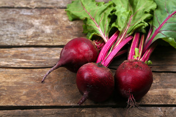 Wall Mural - Young beets on wooden table