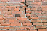 Fototapeta  - Crack in a old brick wall