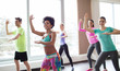 © Syda Productions - group of smiling people dancing in gym or studio