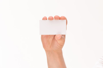 Man's hand holding blank card