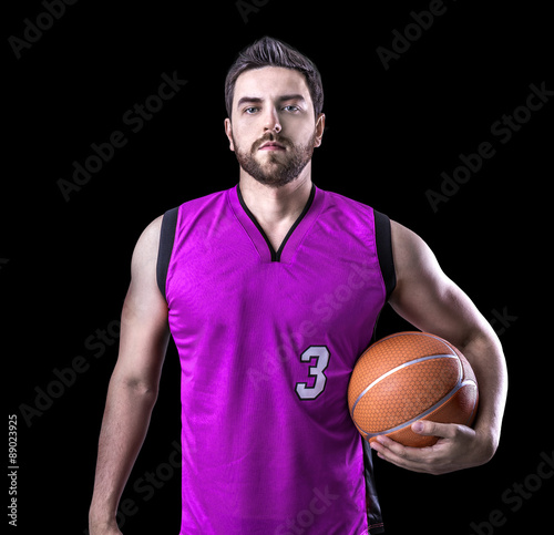 Basketball Player on a purple uniform on black background Poster