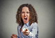 © pathdoc - angry young woman pointing finger at camera screaming