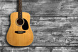 © christianchan - Acoustic guitar on wooden background