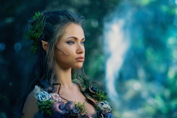 Elf woman in a magical forest