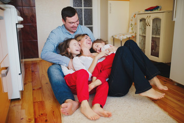 Wall Mural - happy family at home on the floor