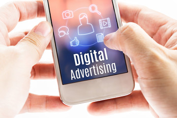 close up hand holding mobile with digital advertising and icons,