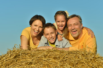 Wall Mural - Happy family in wheat field