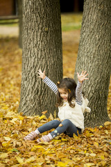 Sticker - Little girl at the autumn park