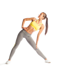 Fitness woman doing exercise, smiling and looking up isolated on white background