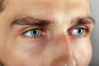 © Africa Studio - Beautiful blue man eyes close up