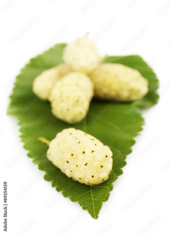 Fresh mulberry isolated on white