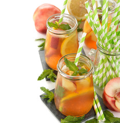 Wall Mural - Ice tea with lemon, peach and mint