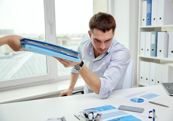 Sticker - businessman taking papers from secretary in office