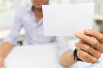 Wall Mural - close up of businessman with blank paper at office