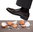 © Carlos Yudica - Man walking on egg shells