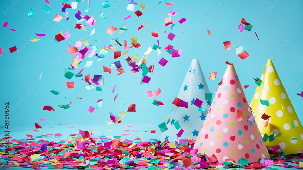 Colored confetti on party hat - obrazy, fototapety, plakaty 